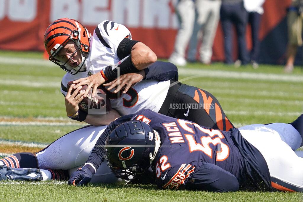 Nam Y. Huh Cincinnati Bengals quarterback Joe Burrow is sacked by Chicago Bears outside linebacker Khalil Mack (52) and Robert Quinn during the first half of an NFL football game Sunday, Sept. 19, 2021, in Chicago. (AP Photo/Nam Y. Huh)