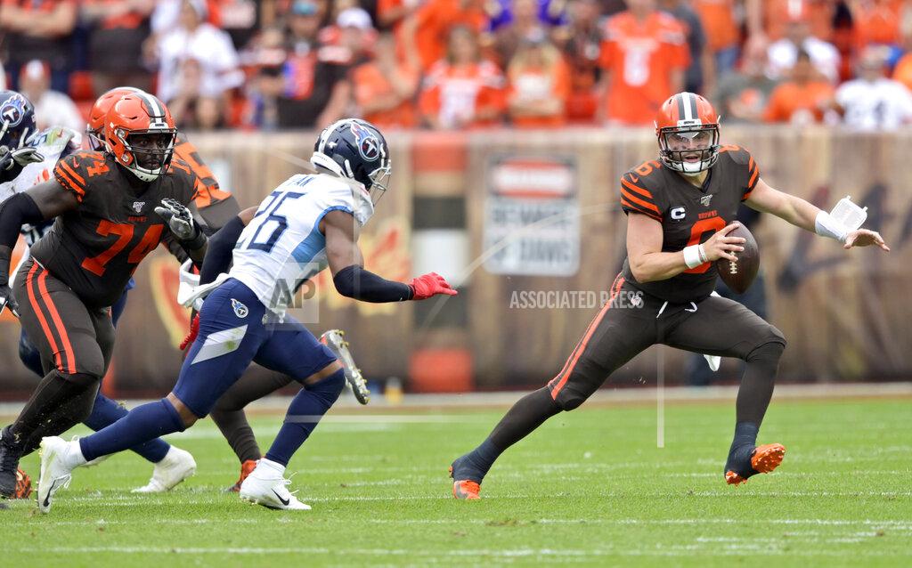 David Richard Cleveland Browns quarterback Baker Mayfield (6) scrambles during the first half in an NFL football game against the Tennessee Titans, Sunday, Sept. 8, 2019, in Cleveland. (AP Photo/David Richard)