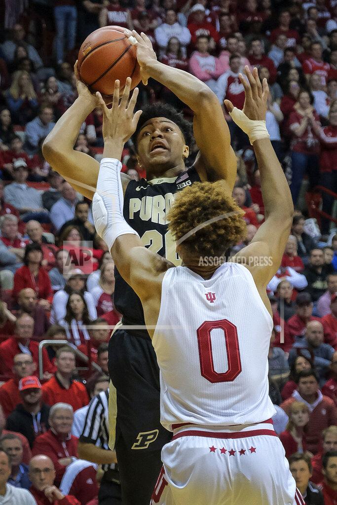 Aj Mast Purdue guard Nojel Eastern, rear, shoots over Indiana guard Romeo Langford during the first half of an NCAA college basketball game in Bloomington, Ind., Tuesday, Feb. 19, 2019. (AP Photo/AJ Mast)