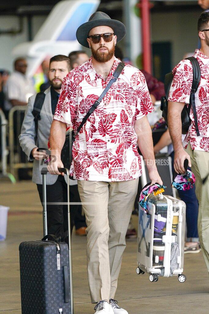 David J. Phillip Kansas City Chiefs' Travis Kelce arrives for the NFL Super Bowl 54 football game Sunday, Jan. 26, 2020, at the Miami International Airport in Miami. (AP Photo/David J. Phillip)