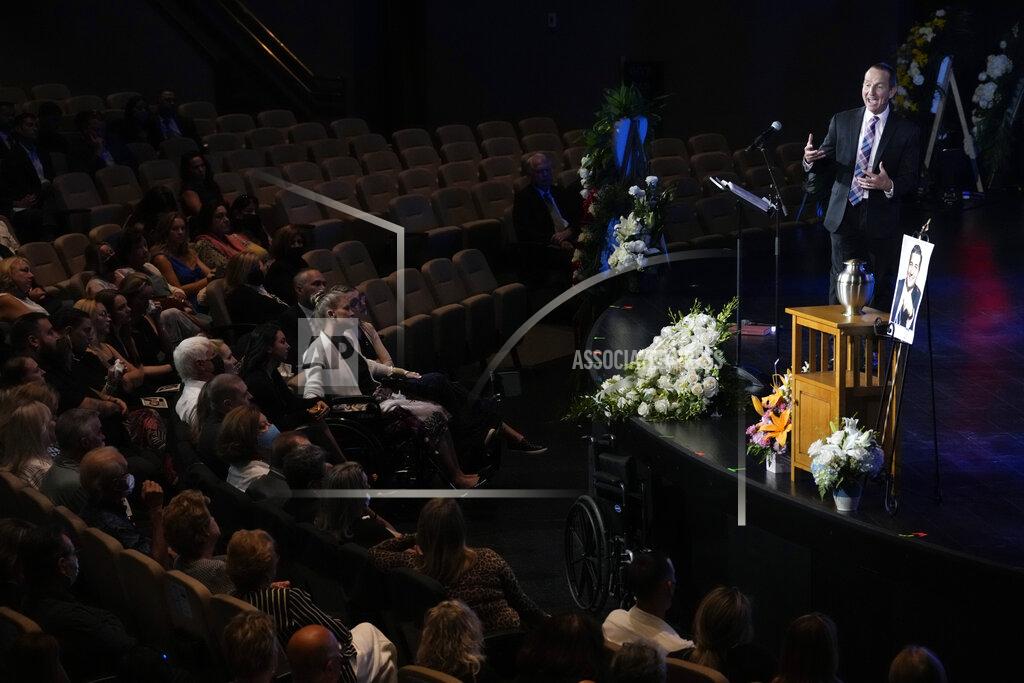 Rebecca Blackwell Pastor Don Robson speaks to mourners during a funeral service for Edgar Gonzalez, who was killed last month in the Champlain Towers South condominium collapse, on Friday, July 23, 2021, in Palmetto Bay, Fla. (AP Photo/Rebecca Blackwell)