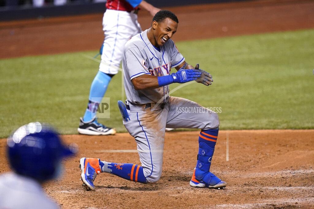 Lynne Sladky New York Mets' Johneshwy Fargas reacts after he was out at the plate during the 12th inning of the team's baseball game against the Miami Marlins, Friday, May 21, 2021, in Miami. The Mets won 6-5 in 12 innings. (AP Photo/Lynne Sladky)
