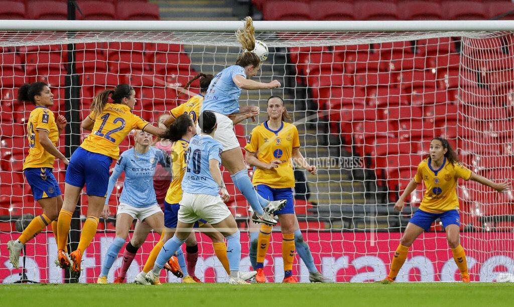 Kirsty Wigglesworth Manchester City's Sam Mewis, top, scores with a header her sides first goal during the Women's FA Cup final soccer match between Everton and Manchester City at Wembley stadium in London, Sunday, Nov. 1, 2020. (AP Photo/Kirsty Wigglesworth, Pool)
