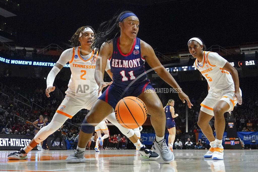 Mark Humphrey Belmont's Destinee Wells (11) moves the ball as she is defended by Tennessee's Alexus Dye (2) and Kaiya Wynn (5) in the second half of a women's college basketball game in the second round of the NCAA tournament Monday, March 21, 2022, in Knoxville, Tenn. Tennessee won 70-67. (AP Photo/Mark Humphrey)