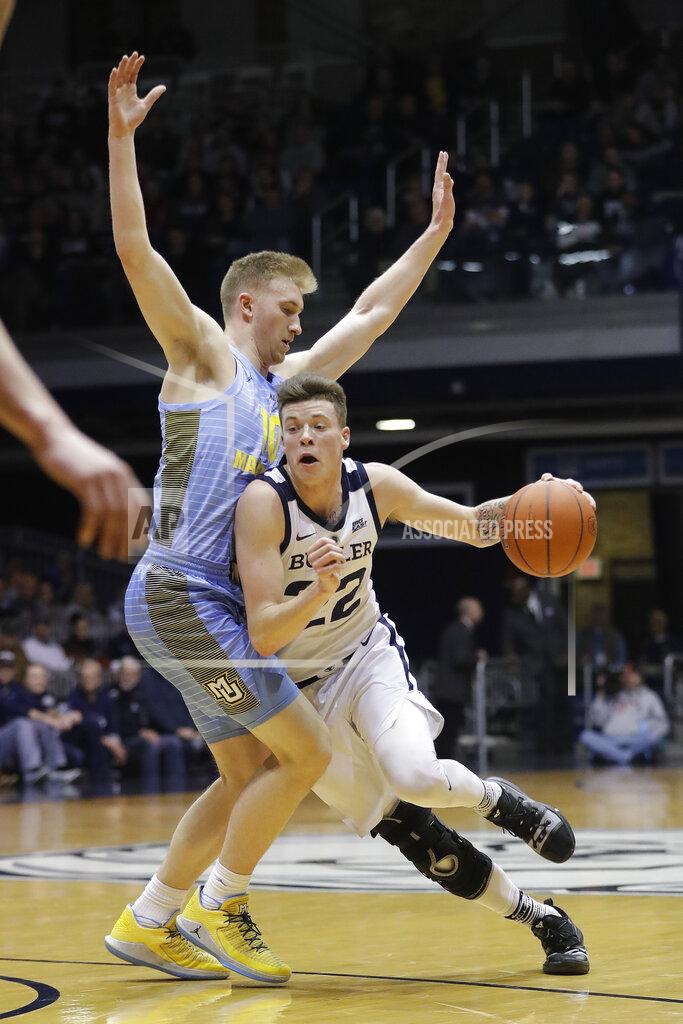 Darron Cummings Butler's Sean McDermott (22) goes to the basket against Marquette's Sam Hauser (10) during the first half of an NCAA college basketball game, Wednesday, Jan. 30, 2019, in Indianapolis. (AP Photo/Darron Cummings)