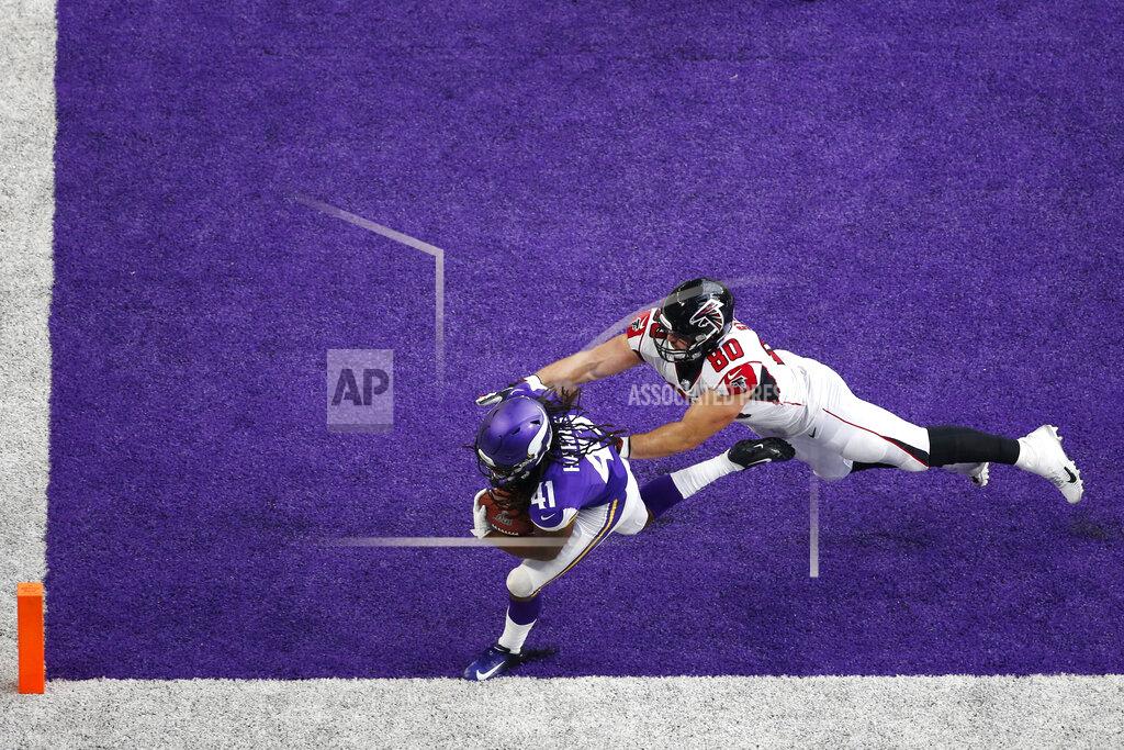 Bruce Kluckhohn Minnesota Vikings defensive back Anthony Harris (41) intercepts a pass intended for Atlanta Falcons tight end Luke Stocker in the end zone during the second half of an NFL football game, Sunday, Sept. 8, 2019, in Minneapolis. (AP Photo/Bruce Kluckhohn)