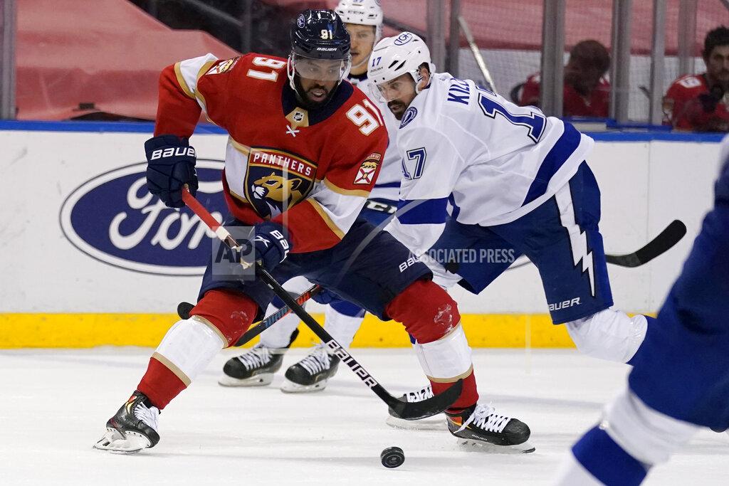 Lynne Sladky Florida Panthers left wing Anthony Duclair (91) controls the puck as Tampa Bay Lightning left wing Alex Killorn (17) defends during the second period of an NHL hockey game, Monday, May 10, 2021, in Sunrise, Fla. (AP Photo/Lynne Sladky)