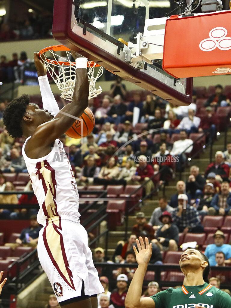 Phil Sears Florida State center Naheem McLeod (24) dunks the ball in the first half of an NCAA college basketball game against Miami in Tallahassee, Fla., Tuesday, Jan. 24, 2023. (AP Photo/Phil Sears)