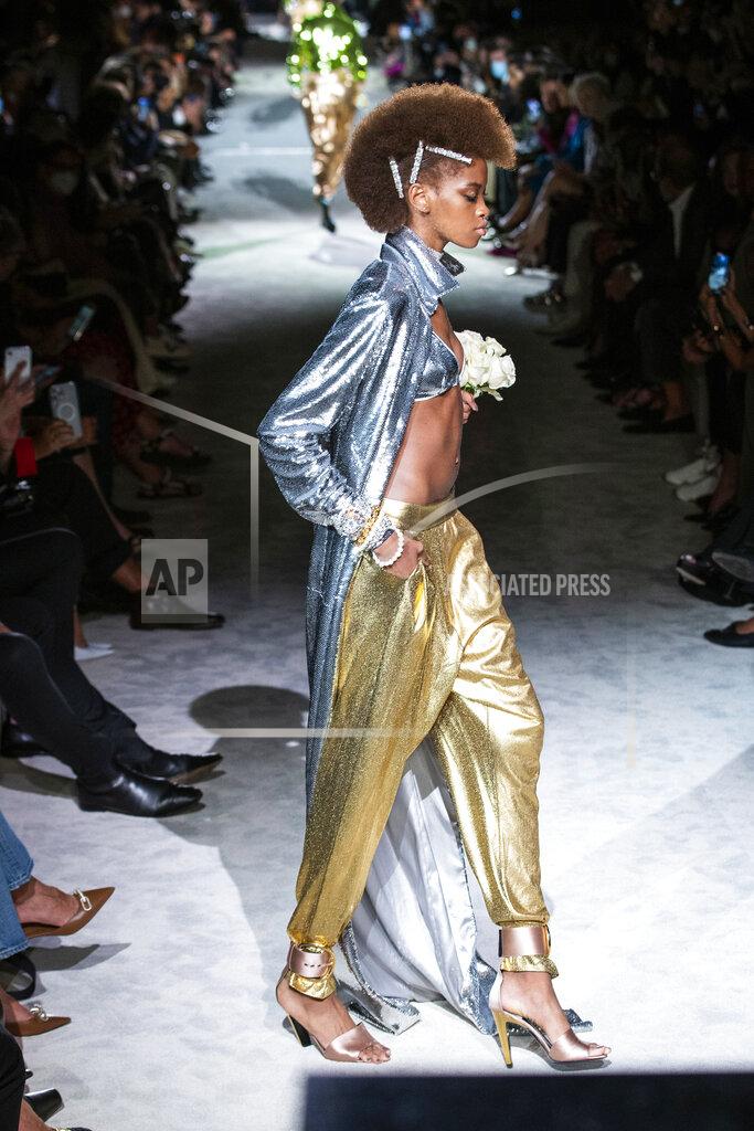 Eduardo Munoz Alvarez Models walk the runway at the Tom Ford spring/summer 2022 fashion show at Lincoln Center during New York Fashion Week on Sunday, Sept. 12, 2021. (AP Photo/Eduardo Munoz Alvarez)