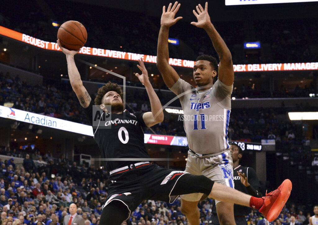Brandon Dill Cincinnati guard Logan Johnson (0) shoots against Memphis guard Antwann Jones (11) in the second half of an NCAA college basketball game Thursday, Feb. 7, 2019, in Memphis, Tenn. (AP Photo/Brandon Dill)
