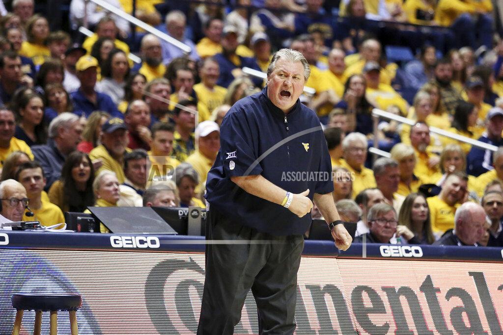Kathleen Batten West Virginia Coach Bob Huggins reacts to a call during the first half of an NCAA college basketball game against Texas Tech, Saturday, Jan. 11, 2020, in Morgantown, W.Va. (AP Photo/Kathleen Batten)