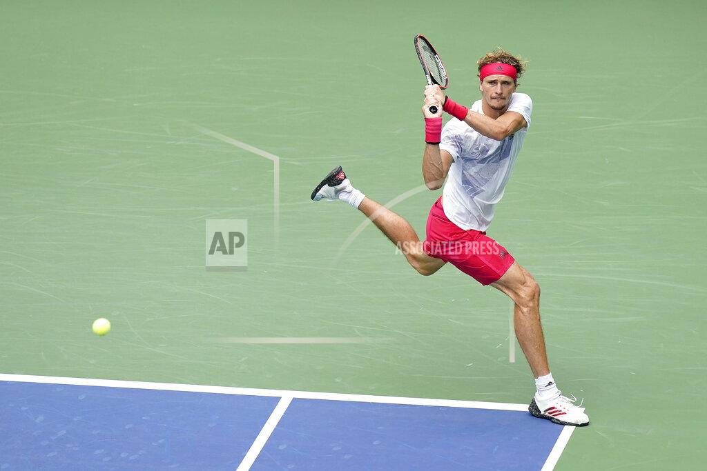 Seth Wenig Alexander Zverev, of Germany, returns a shot to Brandon Nakashima, of the United States, during the second round of the US Open tennis championships, Wednesday, Sept. 2, 2020, in New York. (AP Photo/Seth Wenig)