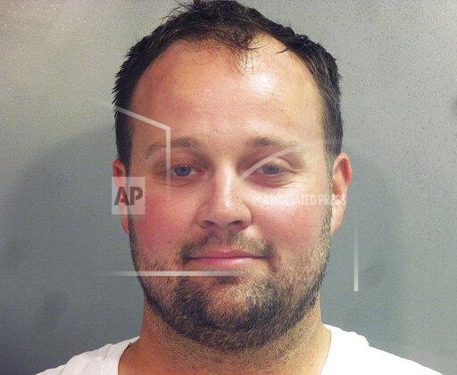 FILE - This undated photo provided by the Washington County (Ark.) Jail shows Joshua Duggar. A federal judge Monday, Oct. 19, 2021, denied motions to suppress evidence from electronic devices seized from Josh Duggar, which federal prosecutors are expected to use during his upcoming child pornography trial. (Washington County Arkansas Jail via AP, File)