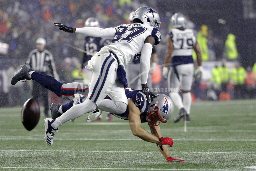 Steven Senne New England Patriots wide receiver Julian Edelman, below, can't catch a pass as Dallas Cowboys cornerback Jourdan Lewis defends in the first half of an NFL football game, Sunday, Nov. 24, 2019, in Foxborough, Mass. (AP Photo/Steven Senne)