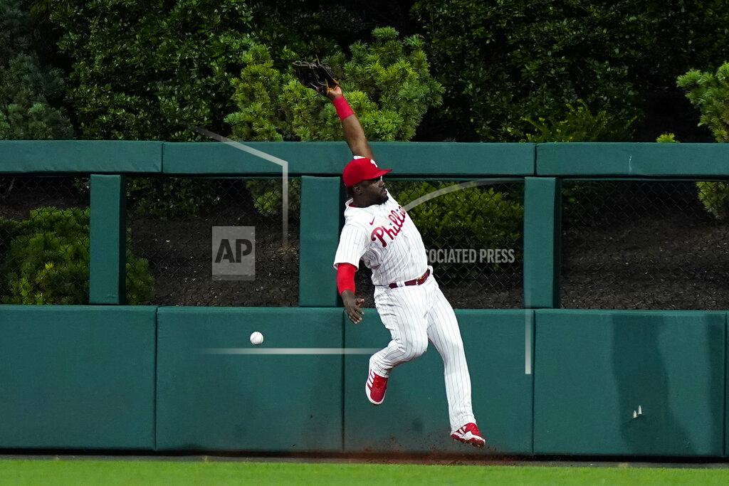 Matt Slocum Philadelphia Phillies center fielder Odubel Herrera cannot catch a two-run double by Washington Nationals' Luis Garcia during the seventh inning of a baseball game, Wednesday, July 6, 2022, in Philadelphia. (AP Photo/Matt Slocum)