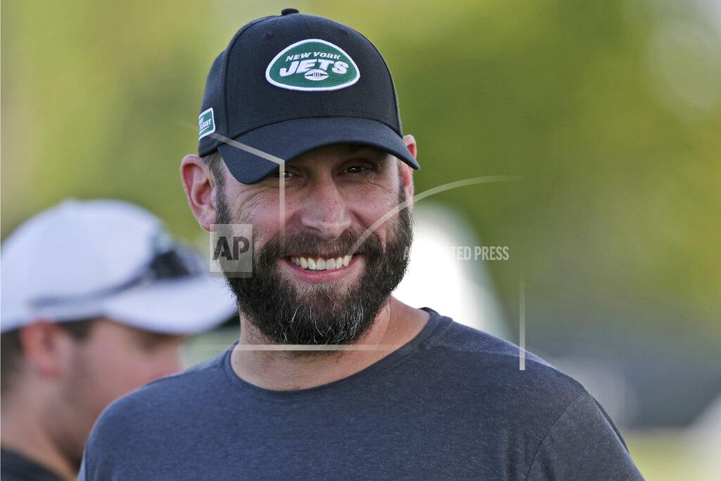 FILE - In this Thursday, July 25, 2019, file photo, New York Jets head coach Adam Gase smiles during practice at the NFL football team's training camp in Florham Park, N.J. Adam Gase still absolutely envisions Jamal Adams as a member of the New York Jets this season. (AP Photo/Seth Wenig, File)