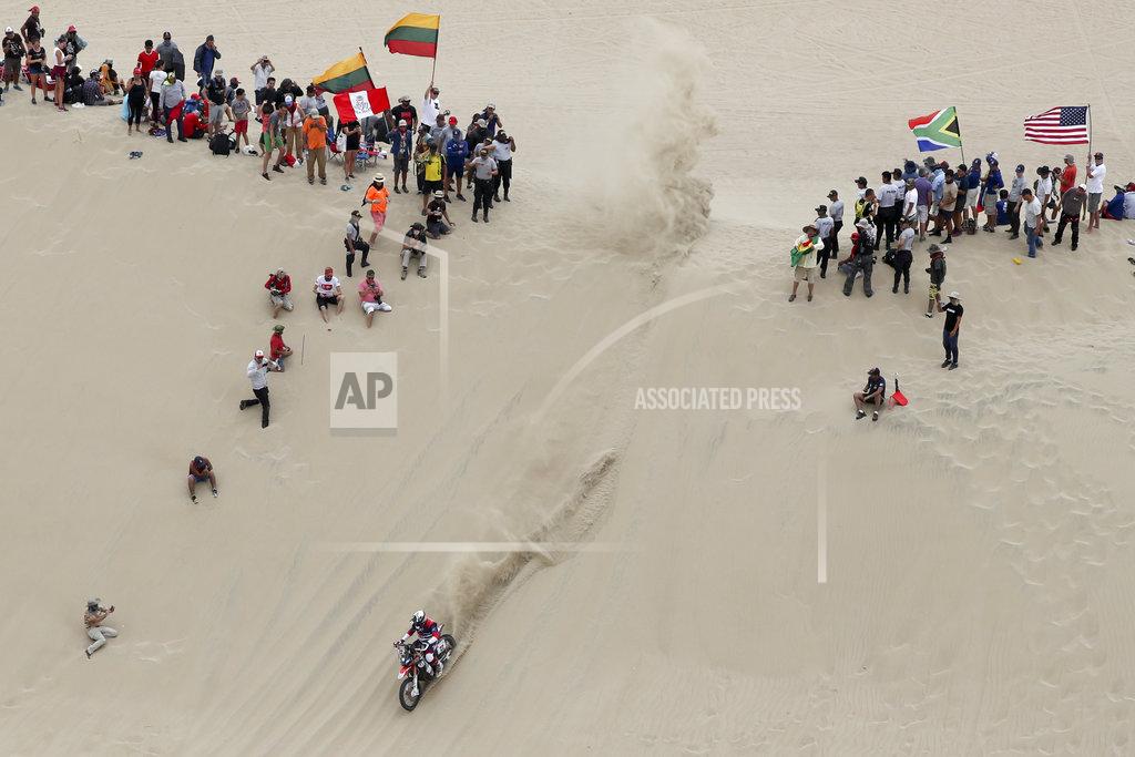 Ricardo Mazalan Martin Duplessis of Argentina rides his Honda motorbike during the first stage of the Dakar Rally between Lima and Pisco, Peru, Monday, Jan. 7, 2019. (AP Photo/Ricardo Mazalan)