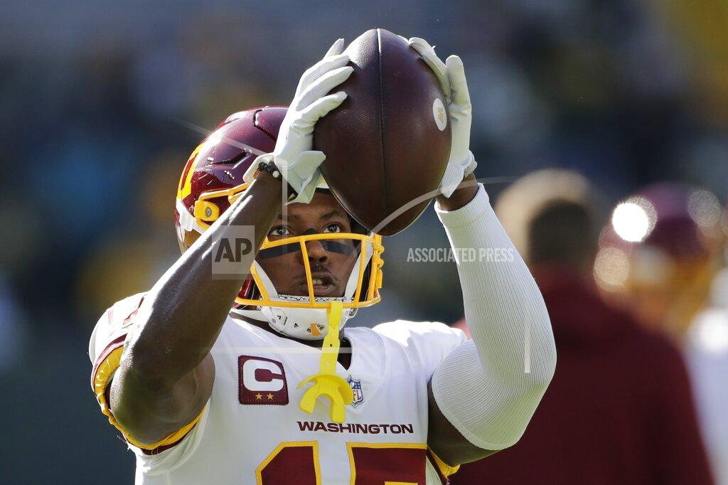 Aaron Gash Washington Football Team's Terry McLaurin warms up before an NFL football game against the Green Bay Packers Sunday, Oct. 24, 2021, in Green Bay, Wis. (AP Photo/Aaron Gash)