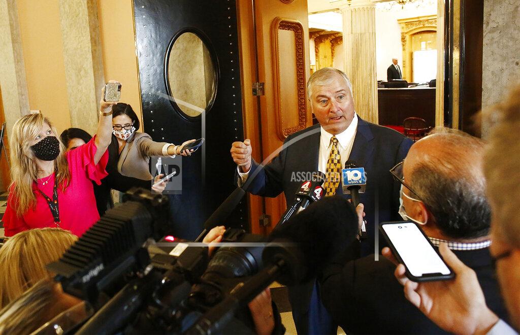 Fred Squillante FILE — This Sept. 1, 2020 file photo shows former Ohio House Speaker Larry Householder talking to the media outside of the House of Representatives in the Ohio Statehouse, in Columbus, Ohio. (Fred Squillante/The Columbus Dispatch via AP)