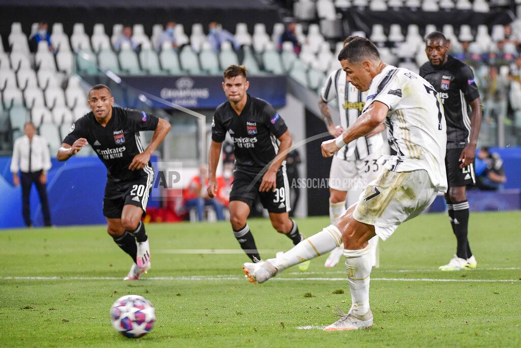 Marco Alpozzi Juventus' Cristiano Ronaldo scores his sides' opening goal on a penalty during the Champions League round of 16 second leg, soccer match between Juventus and Lyon at the Allianz stadium in Turin, Italy, Friday, Aug. 7, 2020. (Marco Alpozzi/LaPresse via AP)