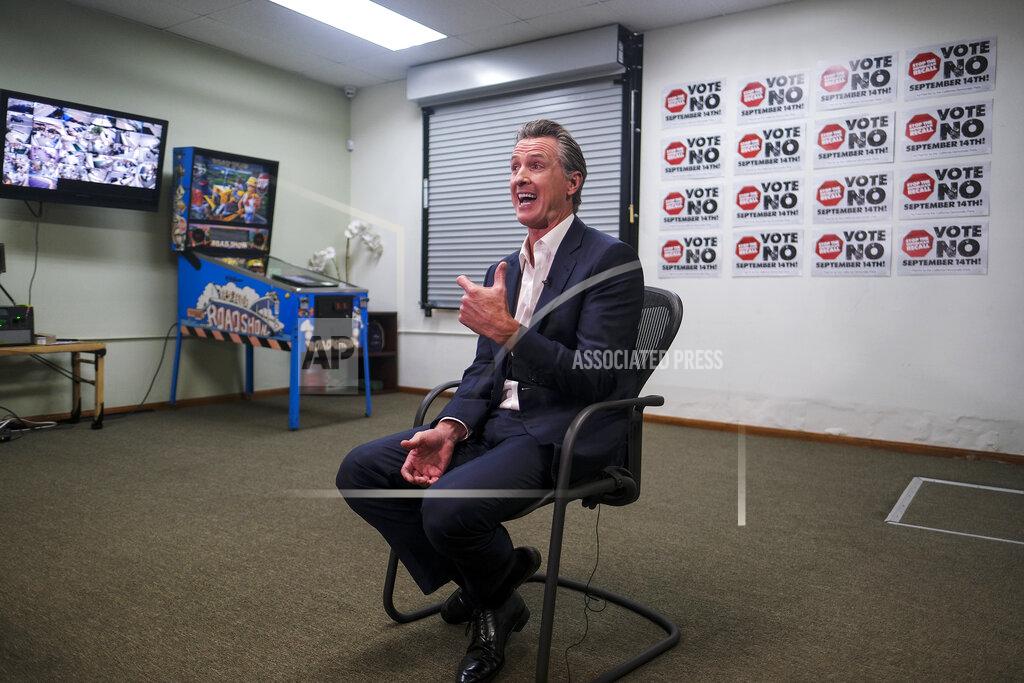 Ringo H.W. Chiu California Gov. Gavin Newsom is photographed during a TV interview before a rally against the California gubernatorial recall election on Sunday, Sept. 12, 2021, in Sun Valley, Calif. (AP Photo/Ringo H.W. Chiu)