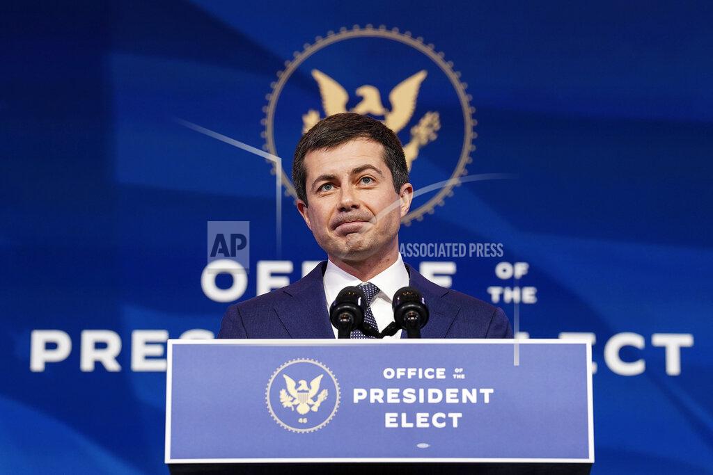 Kevin Lamarque Former South Bend, Ind. Mayor Pete Buttigieg, President-elect Joe Biden's nominee to be transportation secretary, speaks after Biden announced his nomination during a news conference at The Queen theater in Wilmington, Del., Wednesday, Dec. 16, 2020. (Kevin Lamarque/Pool via AP)