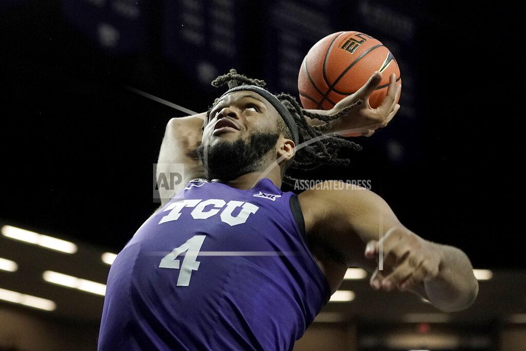 Charlie Riedel TCU center Eddie Lampkin puts up a shot during the first half of an NCAA college basketball game against Kansas State Wednesday, Jan. 12, 2022, in Manhattan, Kan. (AP Photo/Charlie Riedel)
