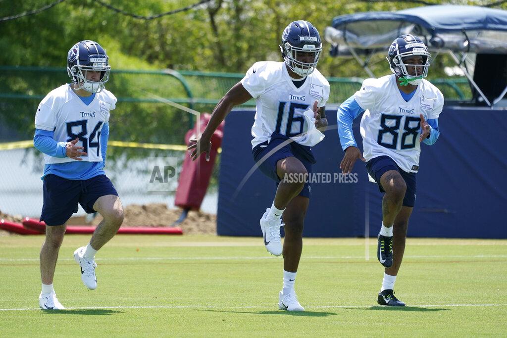 Mark Humphrey Tennessee Titans wide receivers Brandon Lewis (84), Treylon Burks (16) and Reggie Roberson (88) warm up at the NFL football team's rookie minicamp Friday, May 13, 2022, in Nashville, Tenn. (AP Photo/Mark Humphrey)