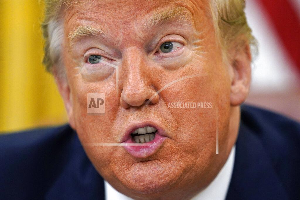 Evan Vucci President Donald Trump speaks before signing an executive order aimed at curbing protections for social media giants, in the Oval Office of the White House, Thursday, May 28, 2020, in Washington. (AP Photo/Evan Vucci)