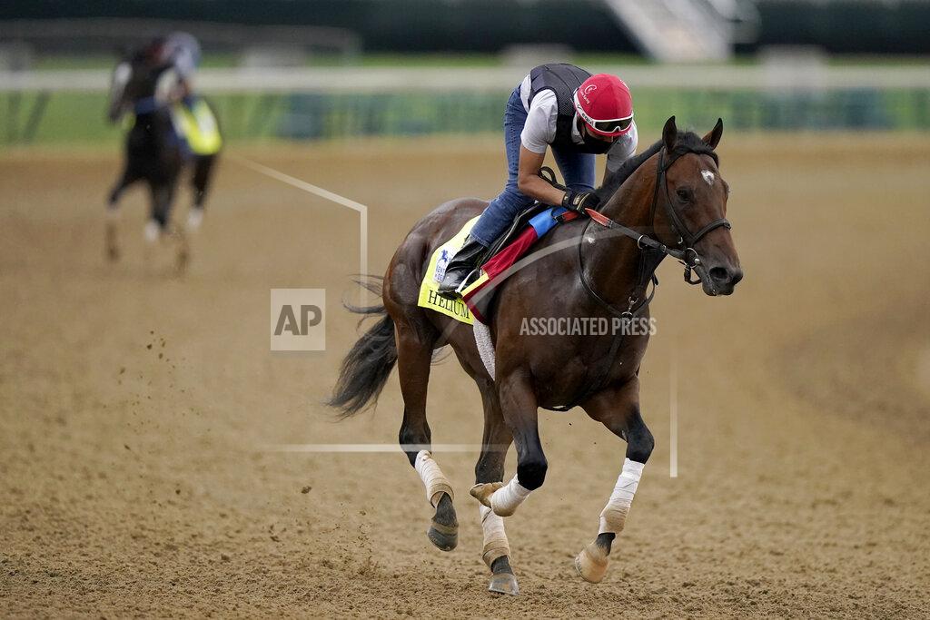 Charlie Riedel Kentucky Derby entrant Helium works out at Churchill Downs Wednesday, April 28, 2021, in Louisville, Ky. The 147th running of the Kentucky Derby is scheduled for Saturday, May 1. (AP Photo/Charlie Riedel)
