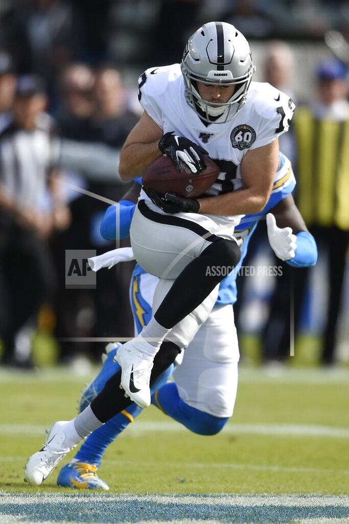Kelvin Kuo Oakland Raiders wide receiver Hunter Renfrow catches a touchdown pass in front of Los Angeles Chargers defensive back Desmond King during the first half of an NFL football game Sunday, Dec. 22, 2019, in Carson, Calif. (AP Photo/Kelvin Kuo)