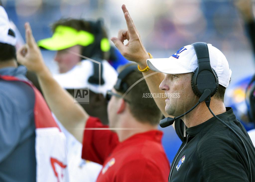 Reed Hoffmann Kansas head coach David Beaty calls instructions to his team against Nicholls State during the first quarter of an NCAA college football game in Lawrence, Kan., Saturday, Sept. 1, 2018. (AP Photo/Reed Hoffmann)