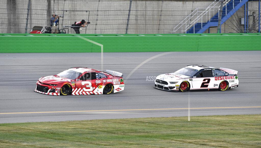 Timothy D. Easley Austin Dillon (3) tries to hold off a challenge from Brad Keselowski (2) during the NASCAR Cup Series auto race at Kentucky Speedway in Sparta, Ky., Saturday, July 13, 2019. (AP Photo/Timothy D. Easley)