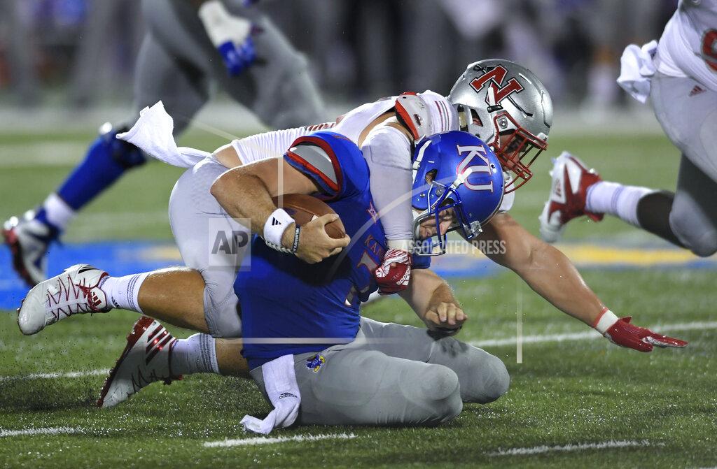 Reed Hoffmann FILE - In this Sept. 1, 2018, file photo, Nicholls State defensive lineman Sully Laiche (55) tackles Kansas' Peyton Bender during the second half of an NCAA college football game, in Lawrence, Kan. Laiche was selected to The Associated Press FCS All-America first team, Tuesday, Dec. 17, 2019. (AP Photo/Reed Hoffmann, File)
