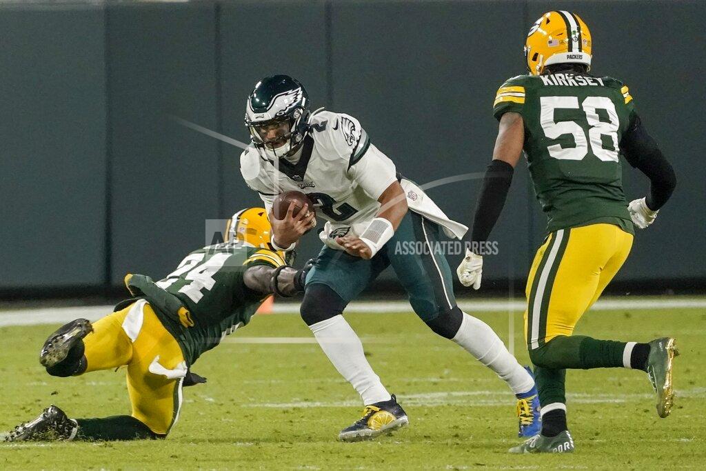 Morry Gash Philadelphia Eagles' Jalen Hurts runs during the second half of an NFL football game against the Green Bay Packers Sunday, Dec. 6, 2020, in Green Bay, Wis. (AP Photo/Morry Gash)