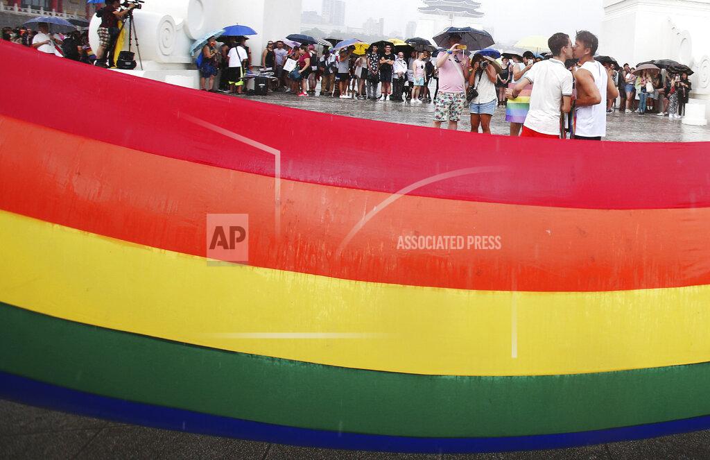 Chiang Ying-Ying Participants march during the "Taiwan Pride March for the World!" at Liberty Square at the CKS Memorial Hall in Taipei, Taiwan, Sunday, June 28, 2020. This year marks the first Gay Pride march in Chicago 1970, and due to the COVID-19 lockdown, Taiwan is one of the very few countries to host the world's only physical Gay Pride. (AP Photo/Chiang Ying-ying)