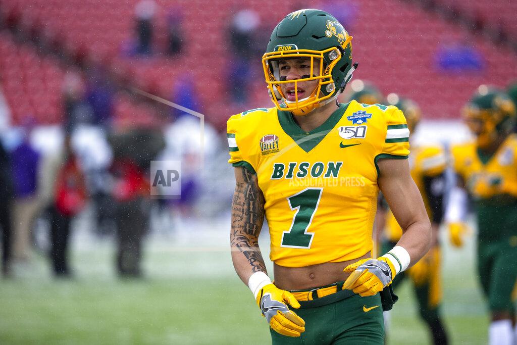 Sam Hodde FILE - North Dakota State wide receiver Christian Watson (1) runs on the field before the FCS championship NCAA college football game against James Madison in Frisco, Texas, in this Saturday, Jan. 11, 2020, file photo. Watson is a member of The Associated Press FCS All-America team, announced Wednesday, May 12, 2021. (AP Photo/Sam Hodde, File)