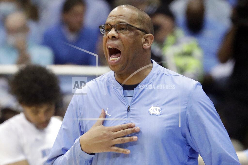 Chris Seward North Carolina head coach Hubert Davis directs the team against Duke during the first half of an NCAA college basketball game, Saturday, Feb. 5, 2022, in Chapel Hill, N.C. (AP Photo/Chris Seward)