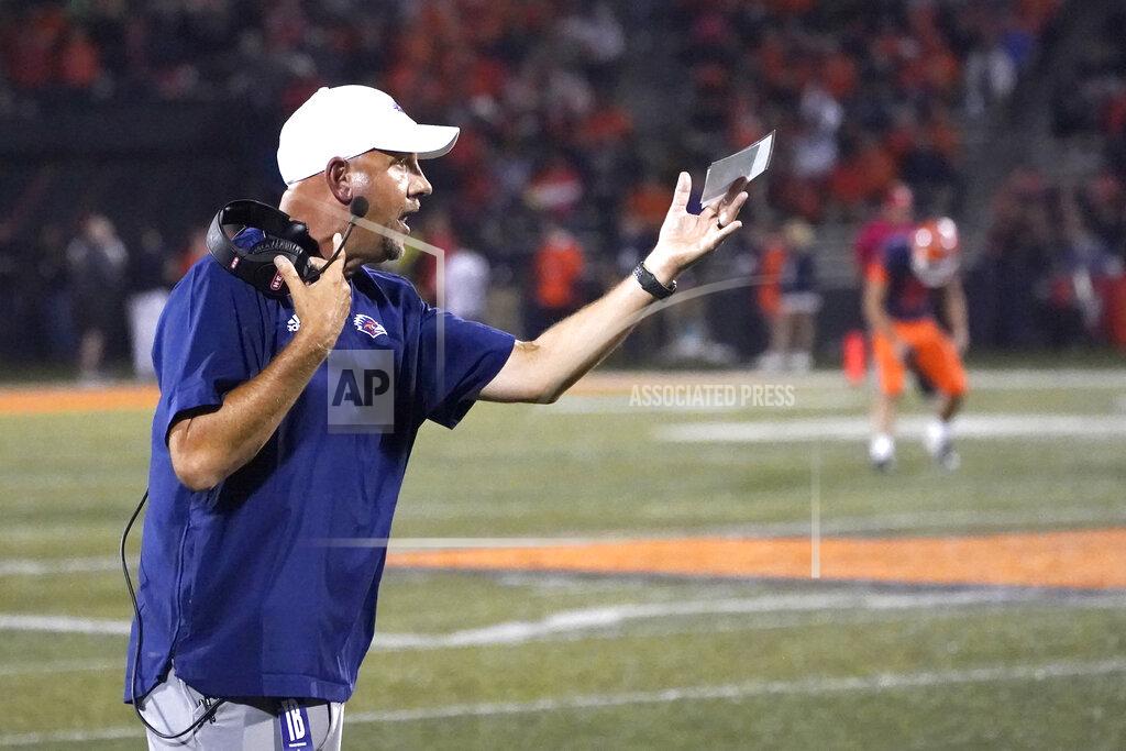 Charles Rex Arbogast UTSA head coach Jeff Taylor gestures during the first half of an NCAA college football game against Illinois, Saturday, Sept. 4, 2021, in Champaign, Ill. (AP Photo/Charles Rex Arbogast)