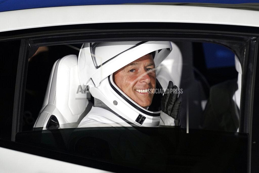 John Raoux NASA astronaut Shane Kimbrough waves as he leaves the operations and checkout building before a launch attempt Friday, April 23, 2021, at the Kennedy Space Center in Cape Canaveral, Fla. Four astronauts will fly on the SpaceX Crew mission to the International Space Station scheduled for launch on April 23, 2021. (AP Photo/John Raoux)