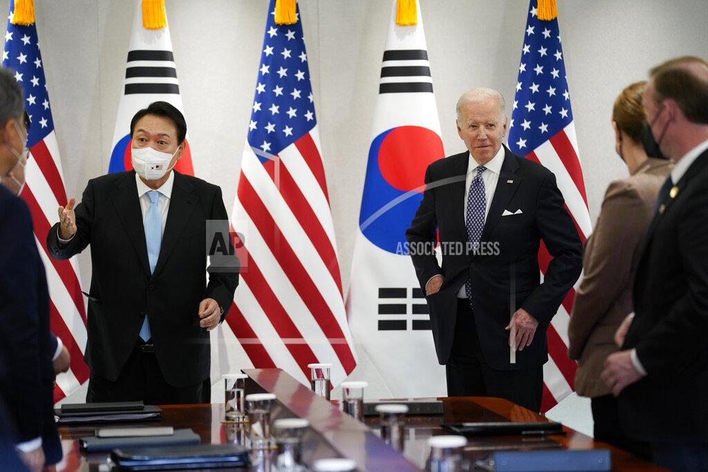 Evan Vucci U.S. President Joe Biden, right, speaks during a news conference with South Korean President Yoon Suk Yeol, left, at the People's House, Saturday, May 21, 2022, in Seoul. (AP Photo/Evan Vucci)