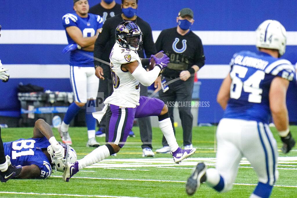 Aj Mast Baltimore Ravens strong safety Chuck Clark (36) heads to the end zone for a touchdown on a fumble recovery against the Indianapolis Colts in the first half of an NFL football game in Indianapolis, Sunday, Nov. 8, 2020. (AP Photo/AJ Mast)