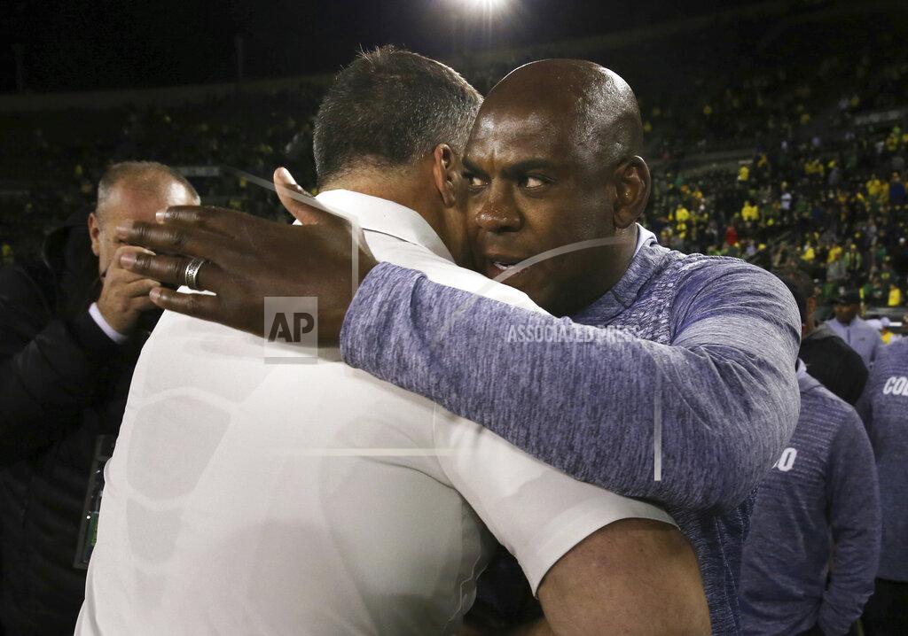 Chris Pietsch Colorado head coach Mel Tucker, right, embraces Oregon head coach Mario Cristobal after their NCAA college football game Friday, Oct. 11, 2019, in Eugene, Ore. Oregon won the game 45-3. (AP Photo/Chris Pietsch)