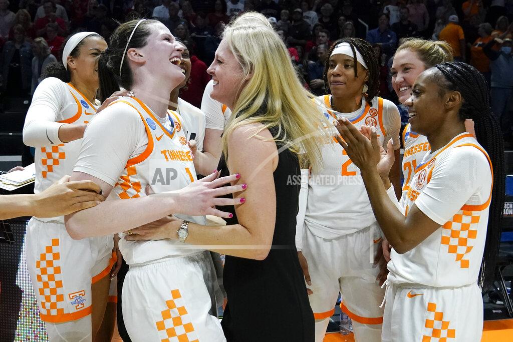 Mark Humphrey Tennessee head coach Kellie Harper celebrates with Sara Puckett (1) after Tennessee beat Belmont in a women's college basketball game in the second round of the NCAA tournament Monday, March 21, 2022, in Knoxville, Tenn. (AP Photo/Mark Humphrey)