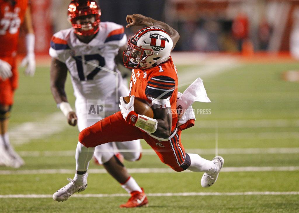 Rick Bowmer Utah quarterback Tyler Huntley (1) carries the ball against Arizona during the first half of an NCAA college football game Friday, Oct. 12, 2018, in Salt Lake City. (AP Photo/Rick Bowmer)