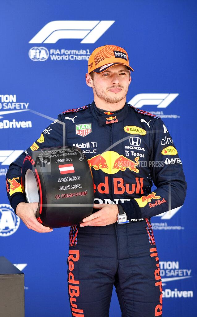 Christian Bruna First place for pole position, Red Bull driver Max Verstappen of the Netherlands holds his prize after the qualifying session ahead of the Austrian Formula One Grand Prix at the Red Bull Ring racetrack in Spielberg, Austria, Saturday, July 3, 2021. The Austrian Grand Prix will be held on Sunday. (Christian Bruna/Pool Photo via AP)