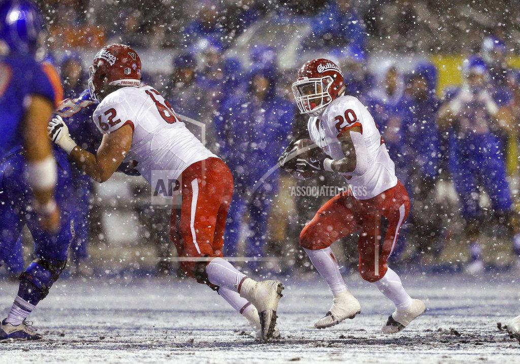 Steve Conner Fresno State running back Ronnie Rivers (20) runs with the ball against Boise State during the first half of an NCAA college football game for the Mountain West championship Saturday, Dec. 1, 2018, in Boise, Idaho. (AP Photo/Steve Conner)