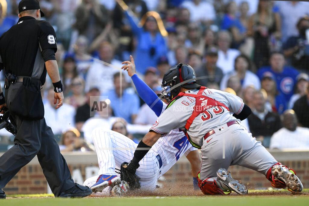 Paul Beaty Chicago Cubs' Willson Contreras (40) scores as Cincinnati Reds catcher Aramis Garcia (33) applies a late tag during the first inning of a baseball game Wednesday, June 29, 2022, in Chicago. (AP Photo/Paul Beaty)
