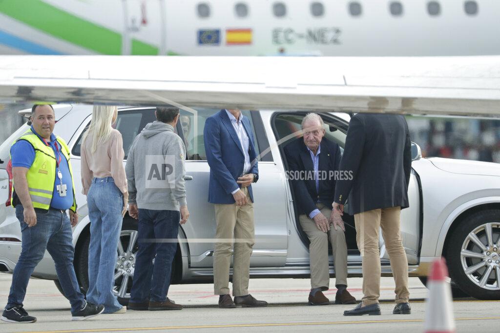 Lalo R. Villar Spain's former King Juan Carlos, 2nd right, sits in a car on arrival by private jet at the Peinador airport in Vigo, north western Spain, Thursday, May 19, 2022. Spain's former King has returned to Spain Thursday for his first visit since leaving nearly two years ago amid a cloud of financial scandals. (AP Photo/Lalo R. Villar)