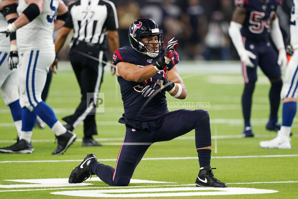 David J. Phillip Houston Texans outside linebacker Brennan Scarlett (57) celebrates a stop during the second half of an NFL football game against the Indianapolis Colts Thursday, Nov. 21, 2019, in Houston. (AP Photo/David J. Phillip)
